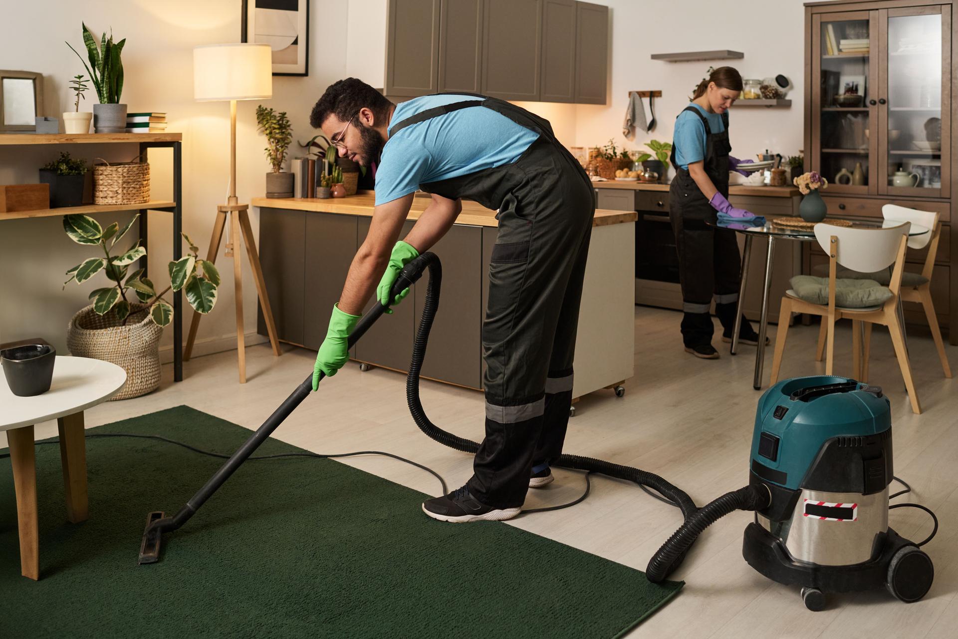 Workers Doing Housework In Apartment